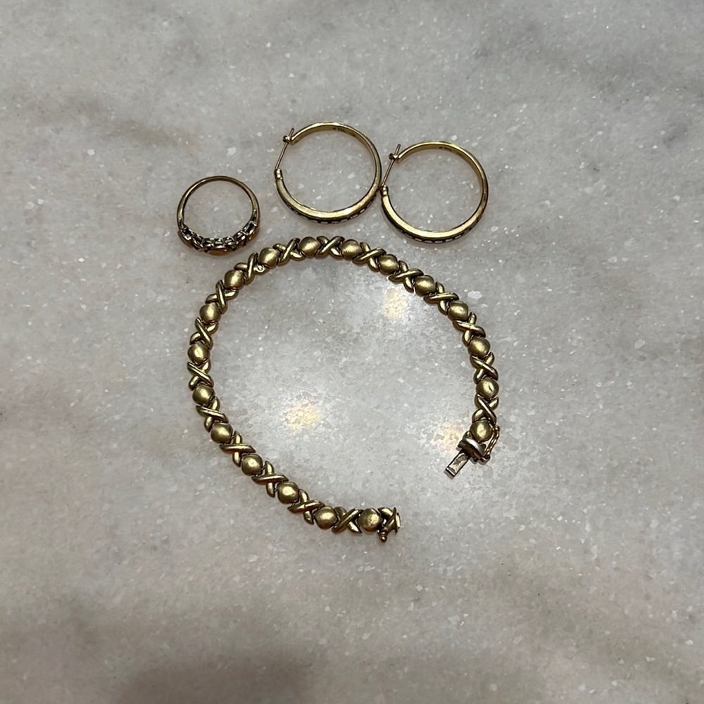 Gold bracelet, ring and diamond earrings
